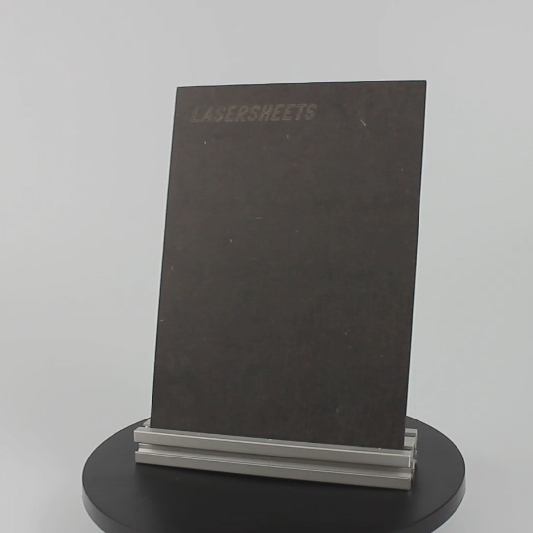 Zwart MDF draait rond